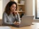 Professional woman writing an email to politely decline a job offer and leave the door open